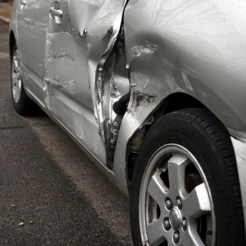 smashed car at unity rage room